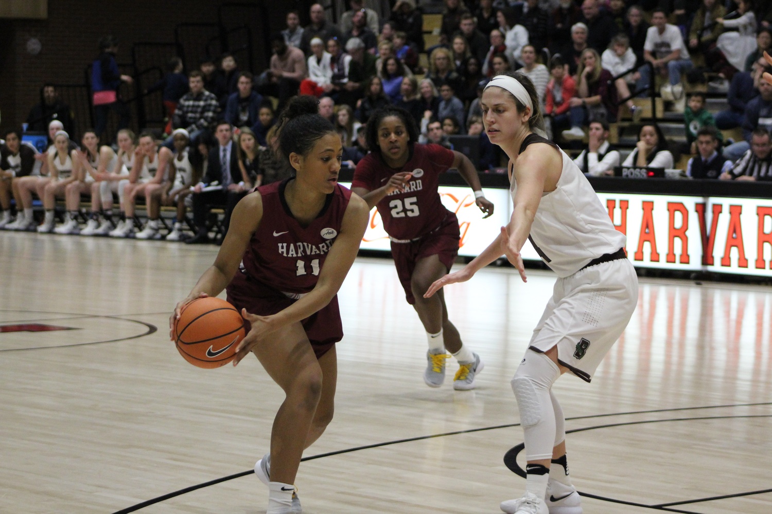 Senior Kirby Porter looks to drive by her Brown defender in a match earlier this season.