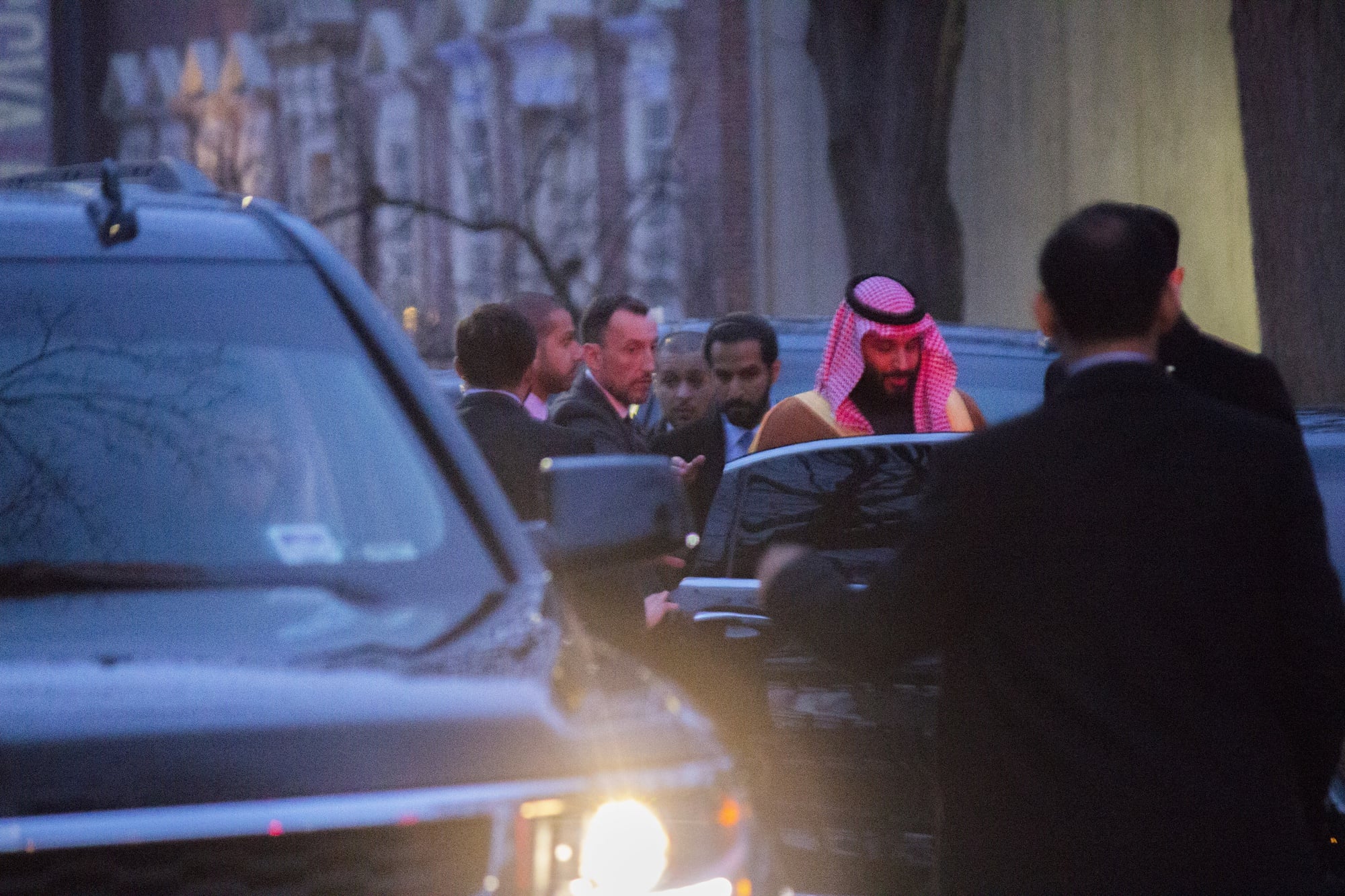 The Crown Prince of Saudi Arabia leaves the Harvard Faculty Club in early 2018 and climbs into a waiting motorcade.