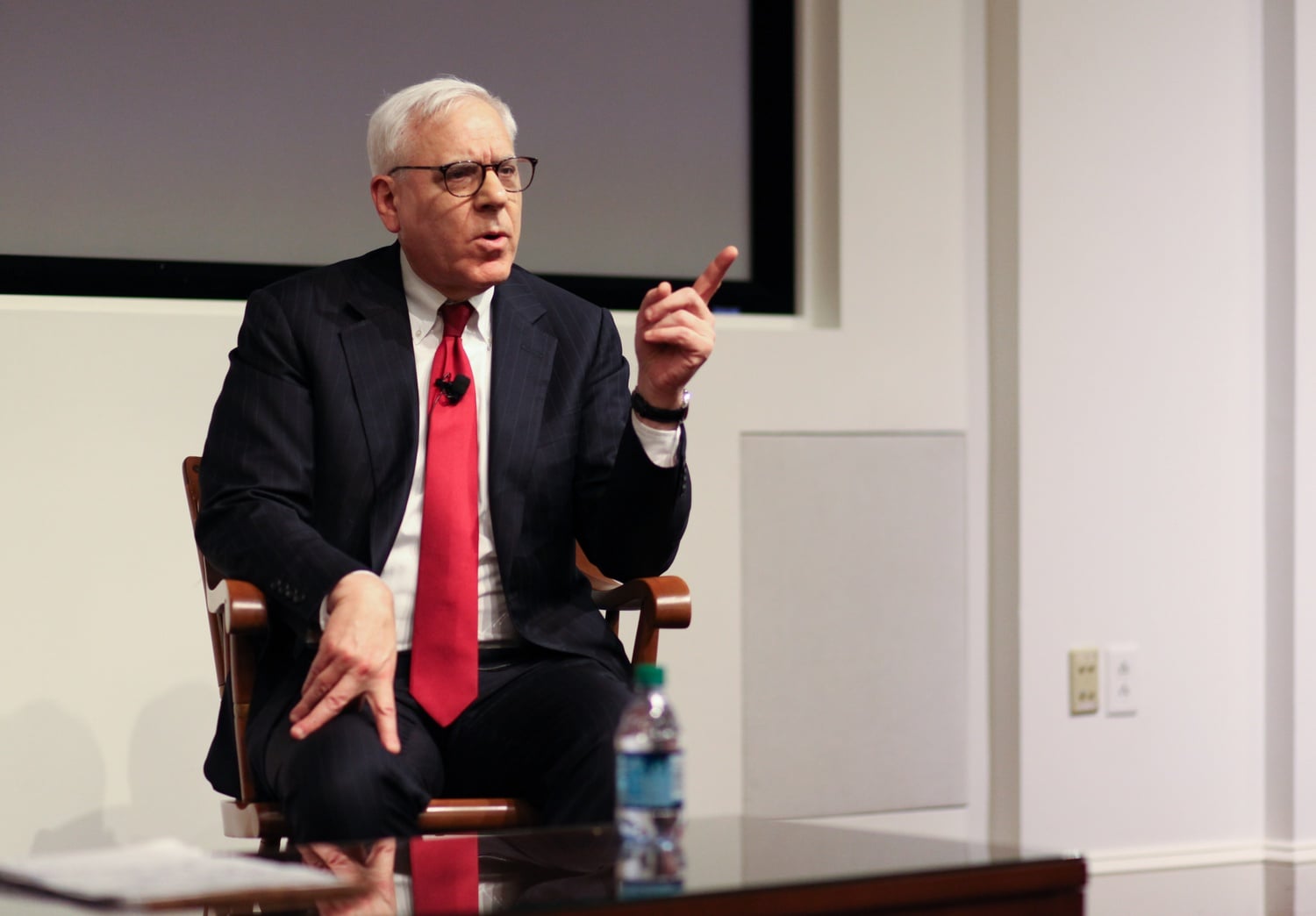 Then-Harvard Corporation member David M. Rubenstein speaks during an interview at the Harvard Business School in 2018. Rubenstein received a Presidential Medal of Freedom on Saturday.
