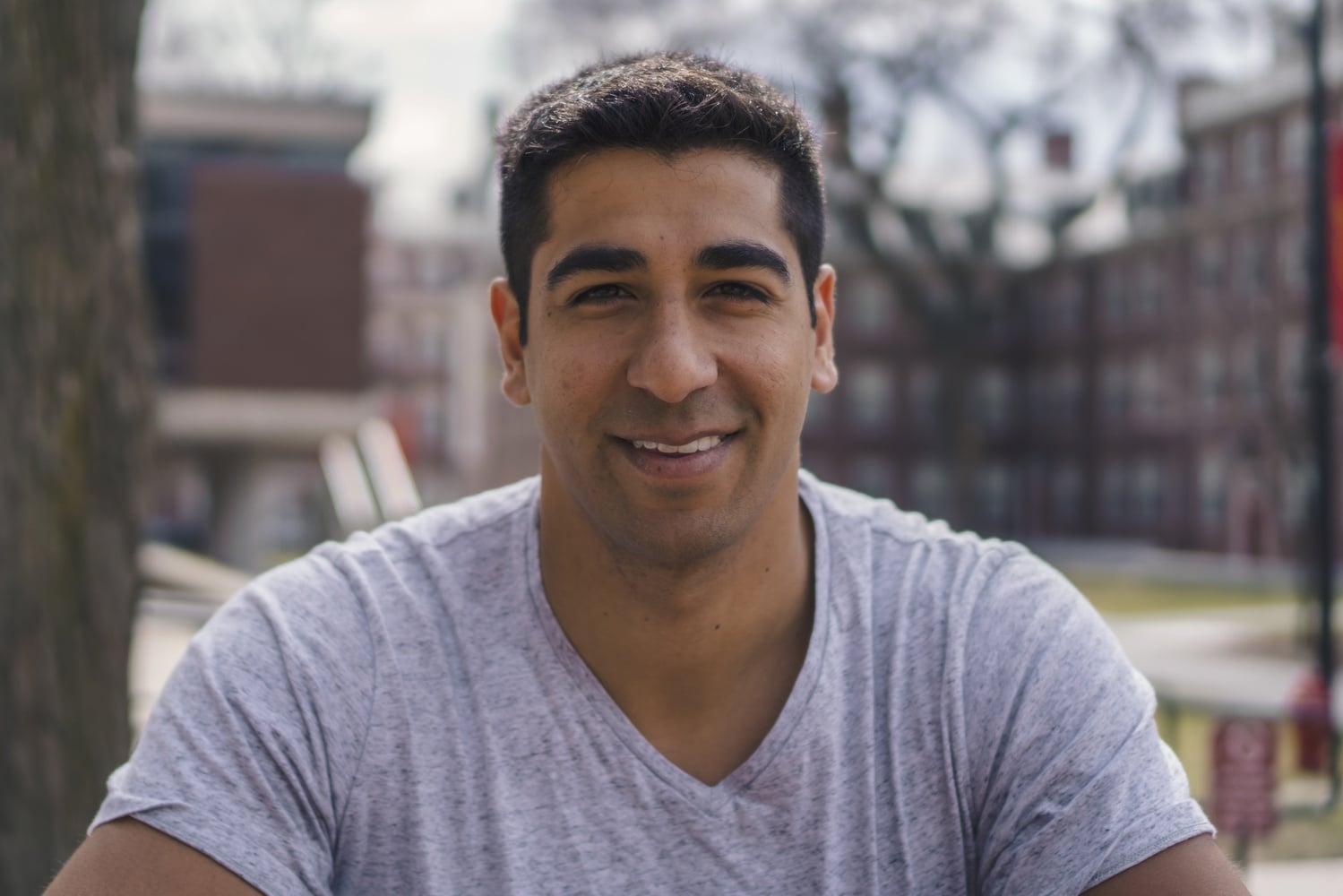 Senan Ebrahim '12, a former Quincy House resident and current tutor, enjoys a nice day outside in O'Donnell courtyard. Ebrahim is a current MD/PhD candidate at the Harvard Medical School and Graduate School of Arts and Sciences.