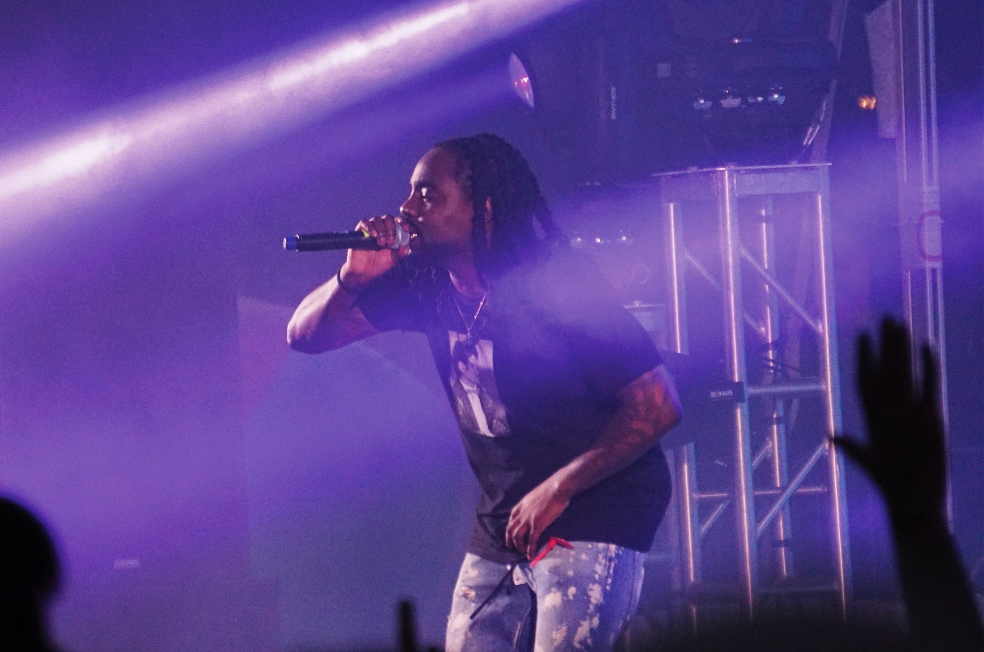 Twenty-five-year-old Washington, D.C. rapper Wale performs in front of a crowd of cheering students in Tercentenary Theater Friday evening during Yardfest. "All you future millionaires, put your hands up," he said during his set.