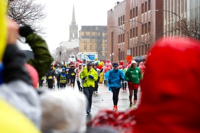 Cover image for Despite Torrential Downpours, Harvard Students Run Boston Marathon