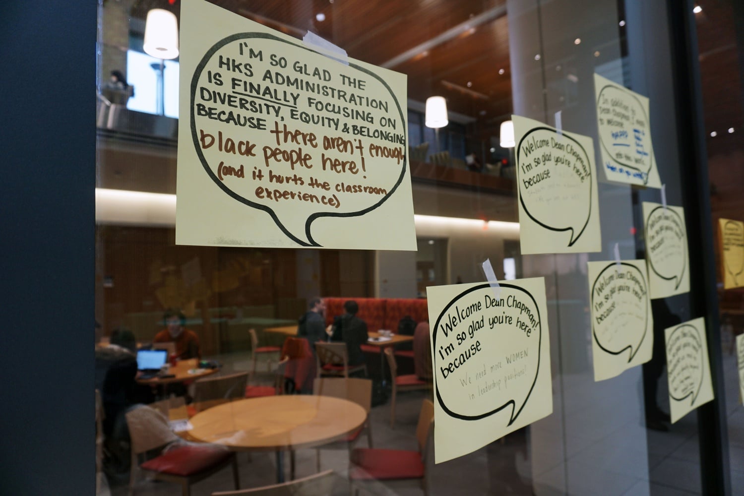 Signs posted on the walls of the Harvard Kennedy School welcoming the school's new diversity dean,  Robbin Chapman.