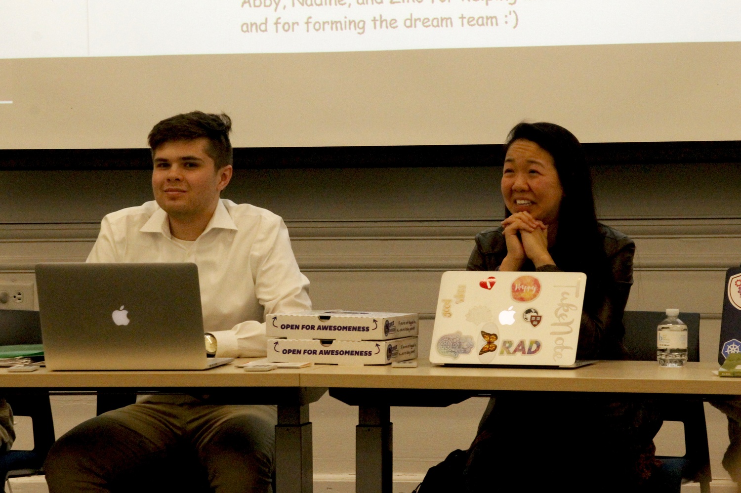 Catherine L. Zhang '19 and Nicholas D. Boucher '19 lead a meeting of the Undergraduate Council in Harvard Hall.