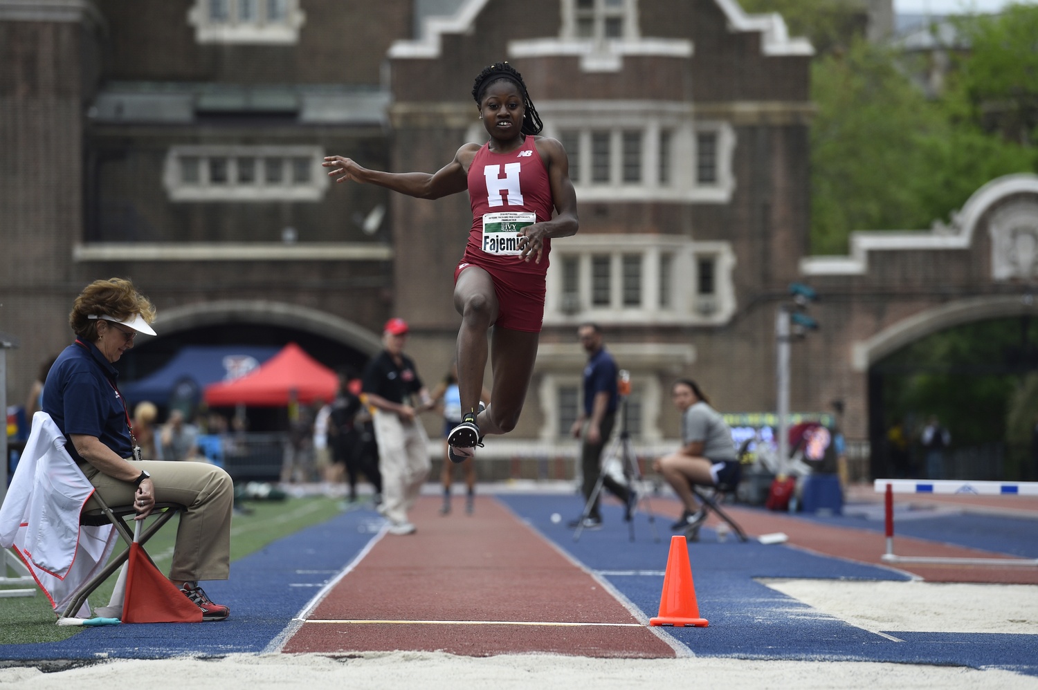 Sophomore Simi Fajemisin takes flight off her last step in the triple jump. The second-year now has competed in four Heps meets, and won three golds. 