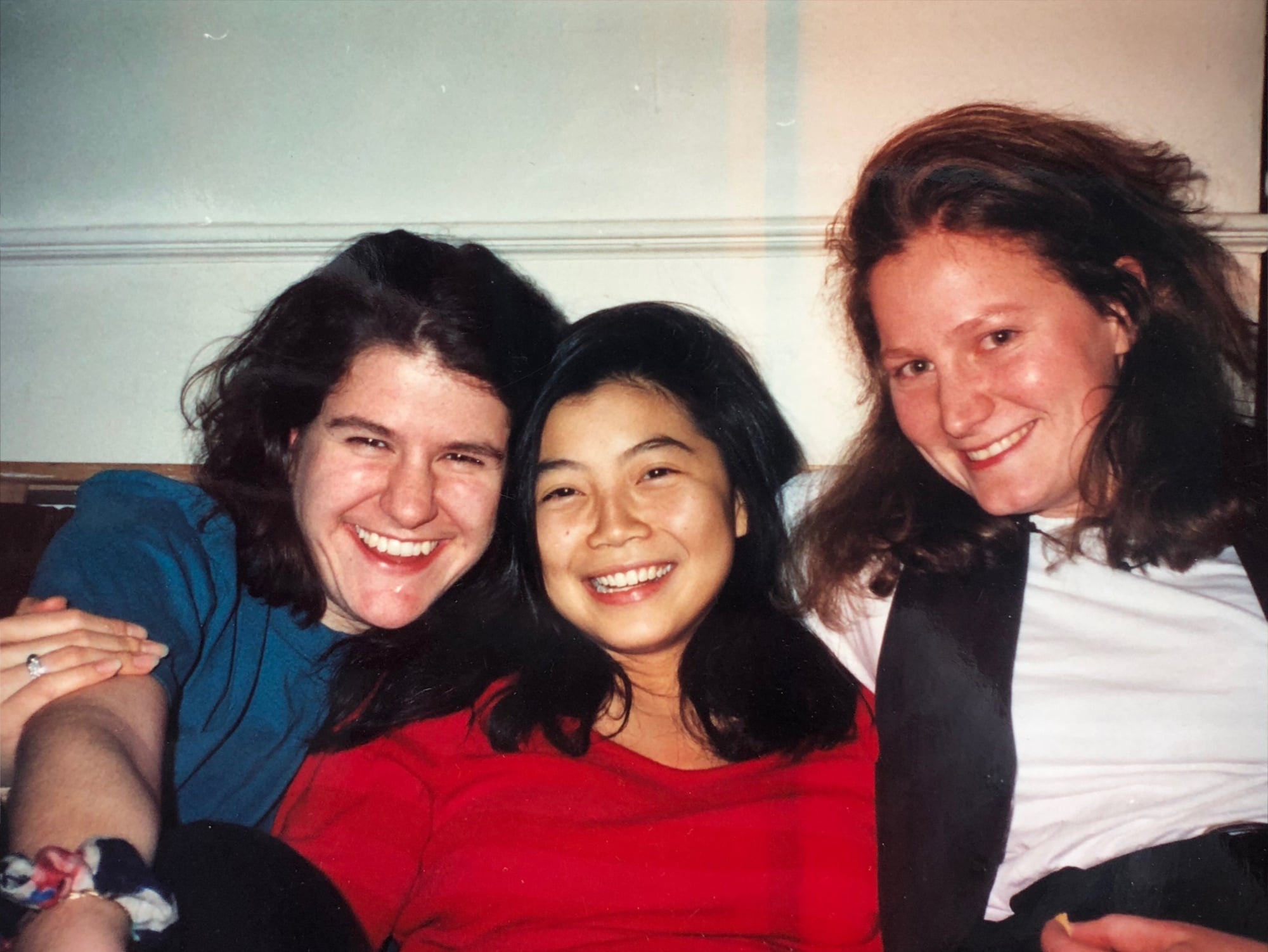 Tracy P. Palandjian '93 is pictured with her college roommates Kate Gellert '93 (left) and Paula Rand Hornbostel '93 (right) in Eliot House.