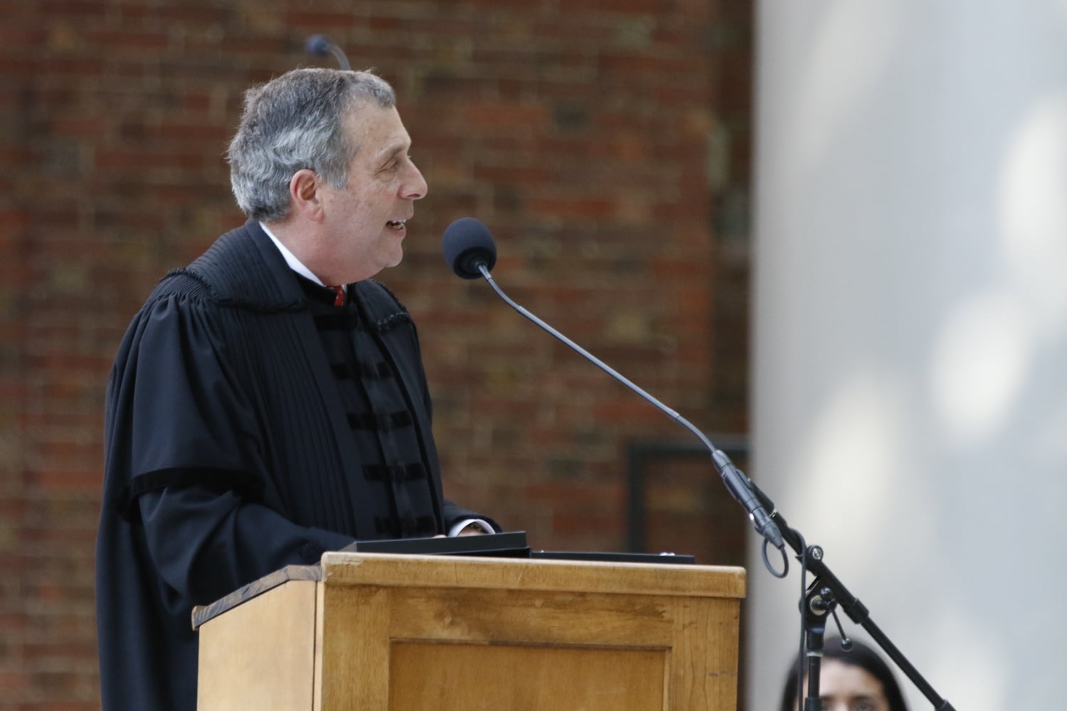 University President Lawrence S. Bacow, pictured here at the 2018 Freshman Commencement, said Harvard will reexamine its admissions processes in light of the nationwide college admissions scandal.