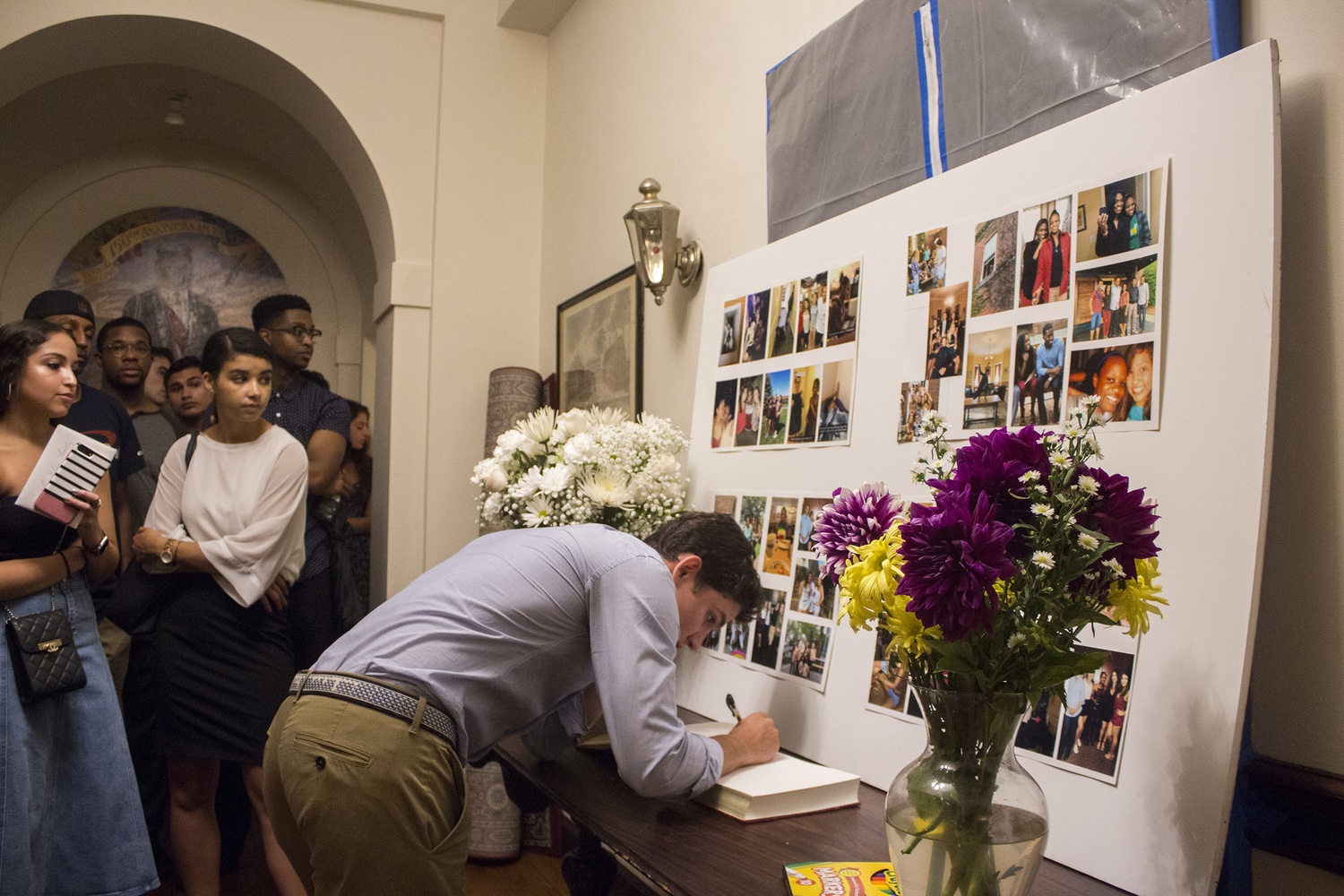 Students lined up in the foyer of the Spee Club to sign a book in memory of Courtney S. Blair '19.
