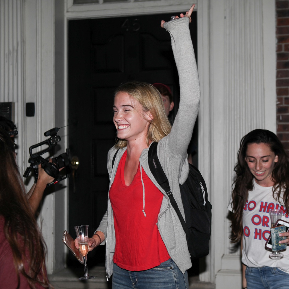 Annabel O'Hagan '19 lifts her arm in celebration after being selected as one of the first six female cast members in the history of Hasty Pudding Theatricals.
