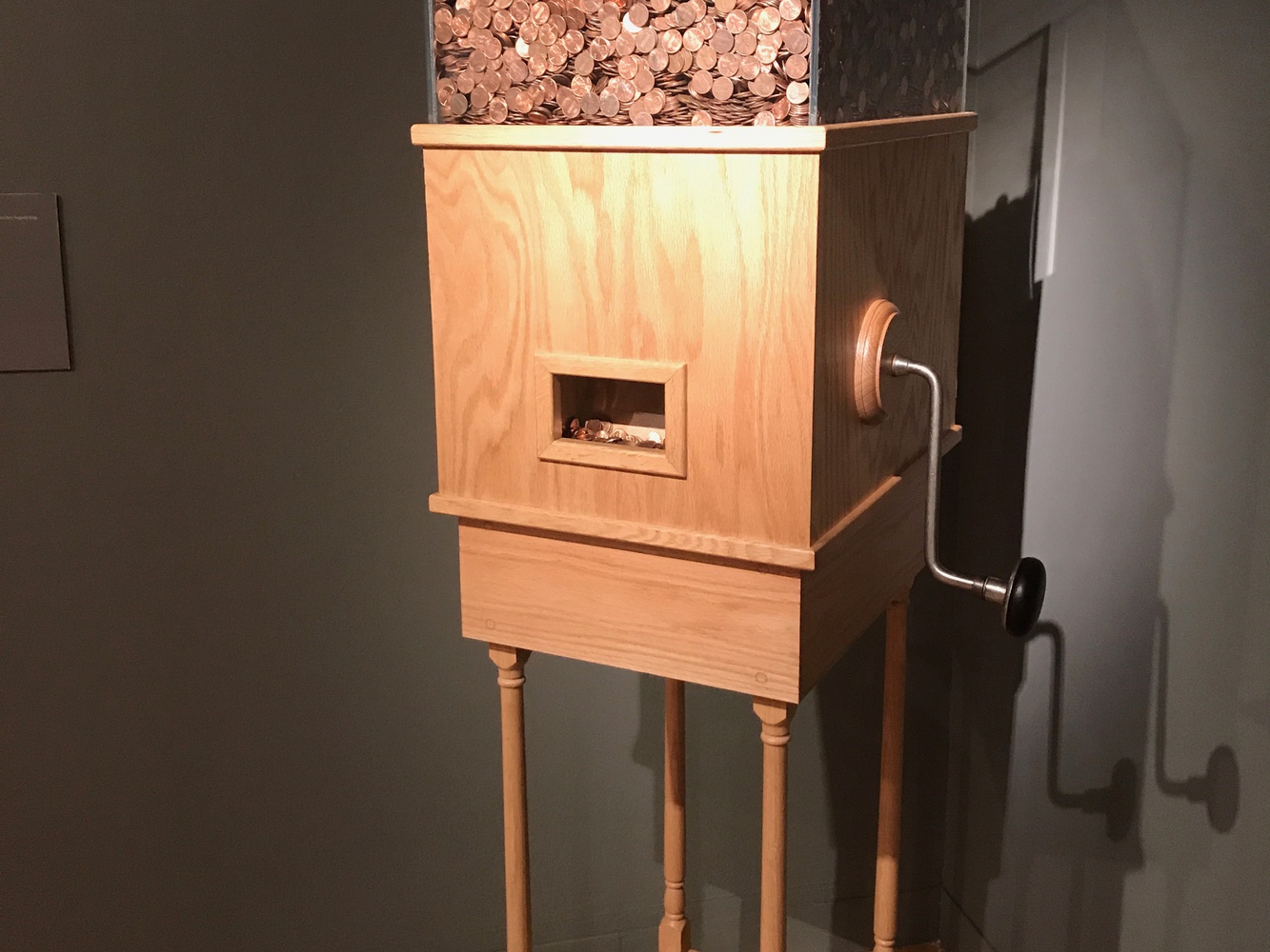 Visitors can crank The Minimum Wage Machine by Blake Fall-Conroy to get one penny every 4 seconds, or $9/hour (minimum wage).