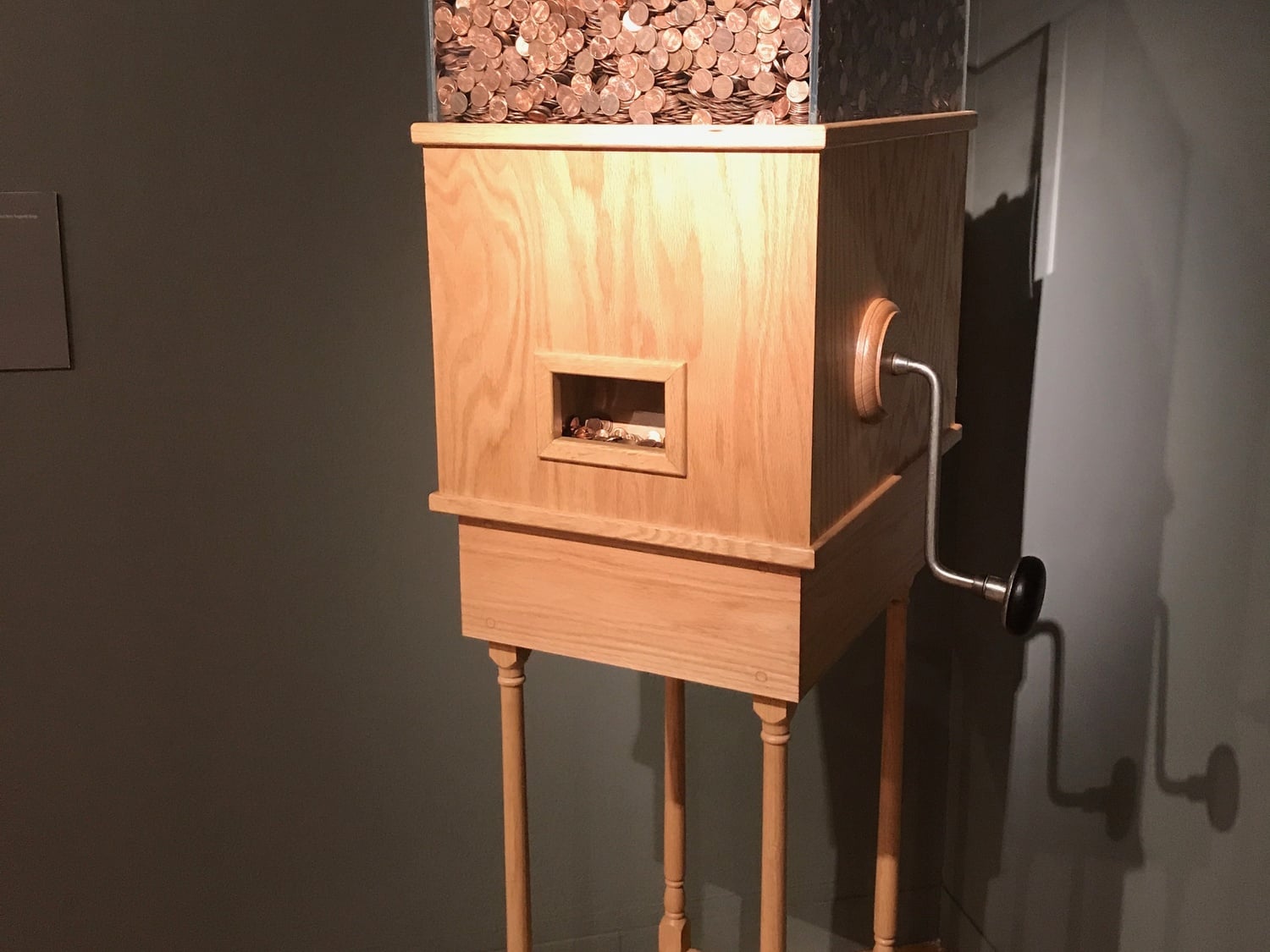 Visitors can crank The Minimum Wage Machine by Blake Fall-Conroy to get one penny every 4 seconds, or $9/hour (minimum wage).
