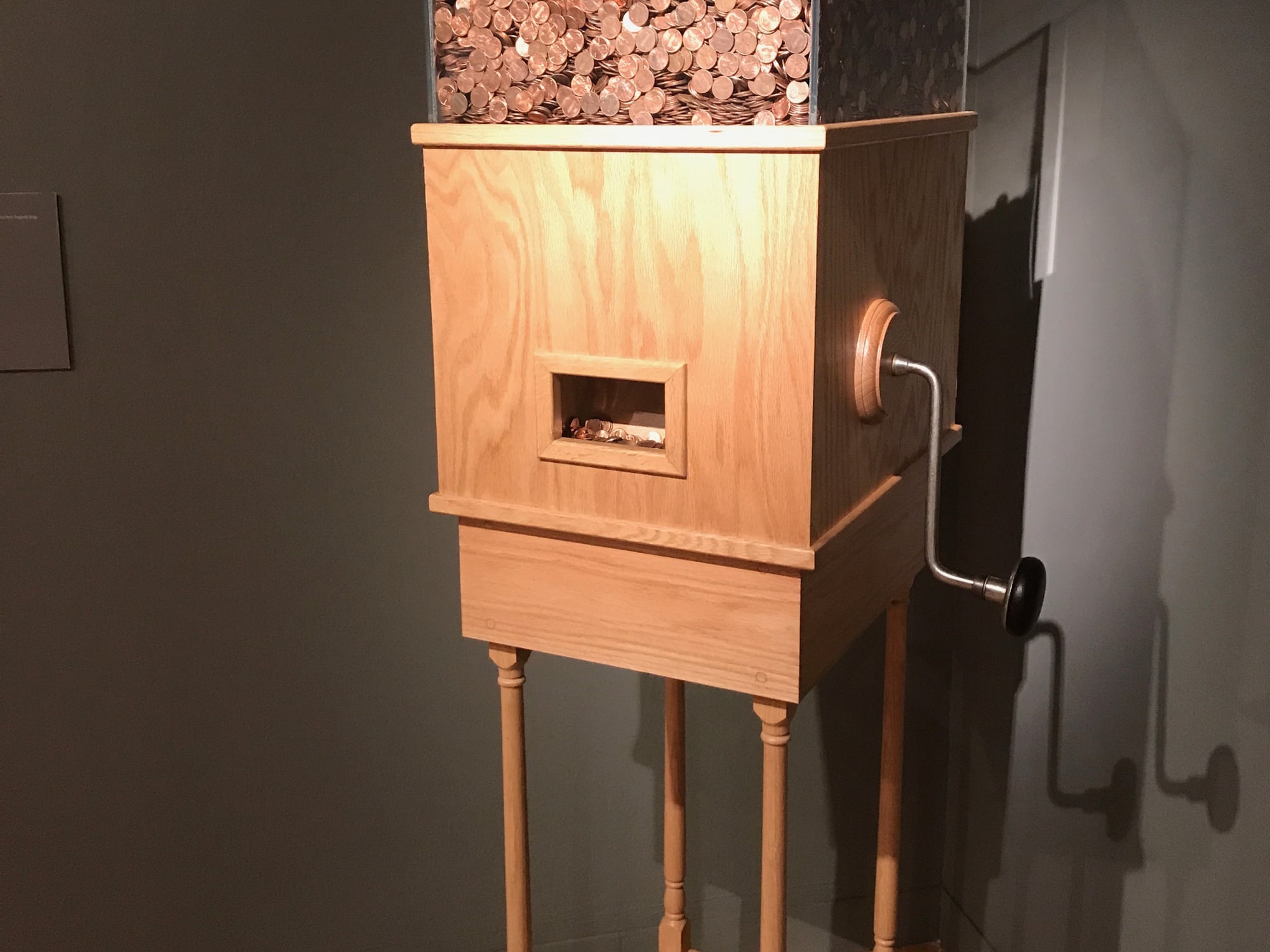 Visitors can crank The Minimum Wage Machine by Blake Fall-Conroy to get one penny every 4 seconds, or $9/hour (minimum wage).