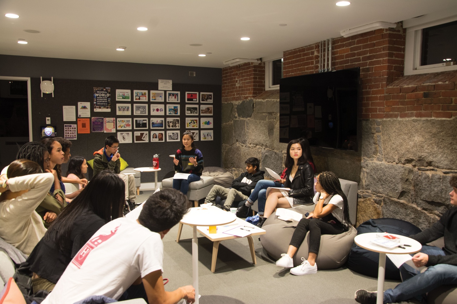 Students meet in Grays Hall Basement to discuss the ongoing affirmative action lawsuit against Harvard.