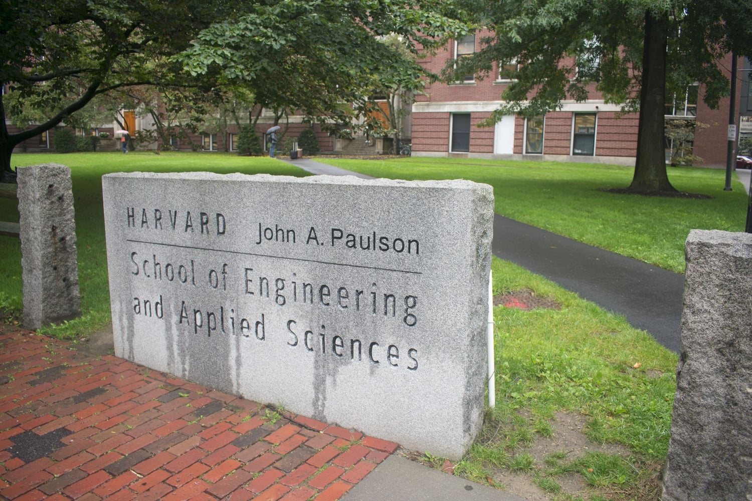 The John A. Paulson School of Engineering and Applied Sciences sign stands in front of Pierce Hall.