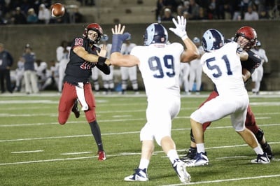Cover image for In Photos: Football Drops First Game of the Season to Rhode Island