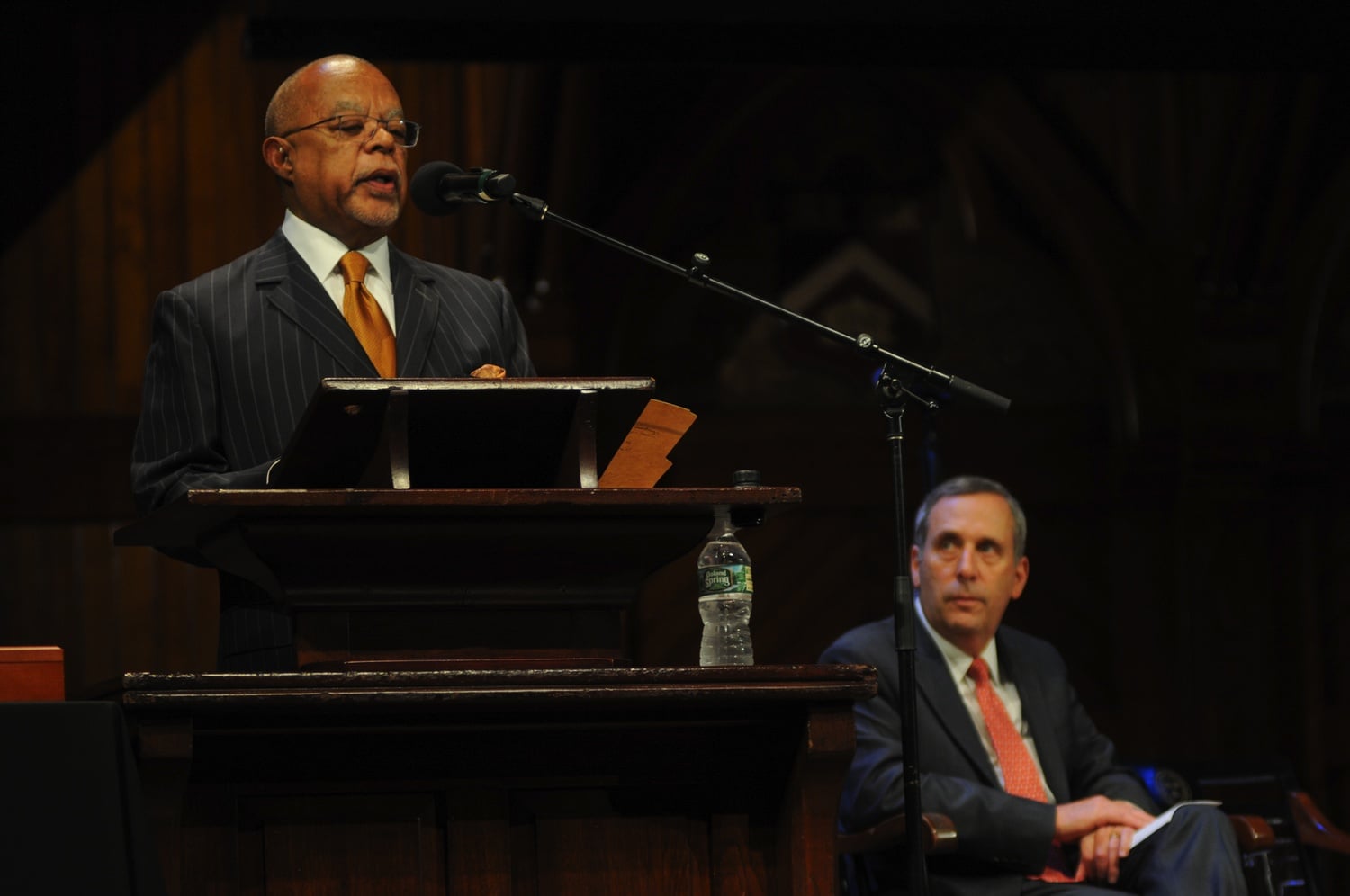 Henry Louis Gates Jr. delivers opening remarks at the W.E.B. Du Bois Medal Ceremony. In this moment he is praising University President Lawrence S. Bacow for his commitment to diversity early in his presidential term.