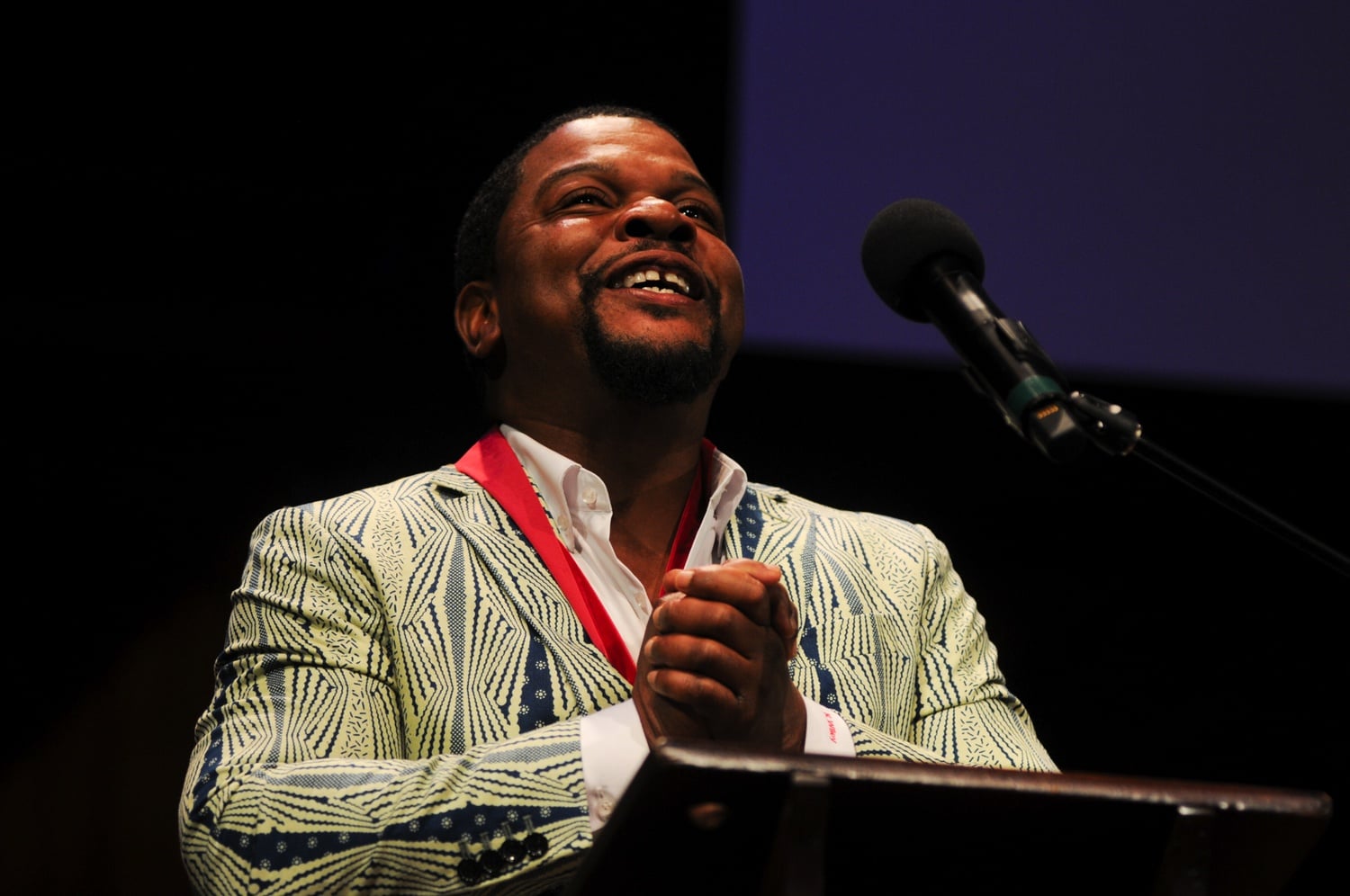 Renowned artist Kehinde Wiley delivers a short speech to accept his medal. Wiley is known for his uniqely-styled works of portrait art, which include the 2018 portrait of Barack Obama.
