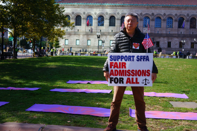 Cover image for In Photos: Dueling Rallies Mark the Start of Harvard Admissions Trial