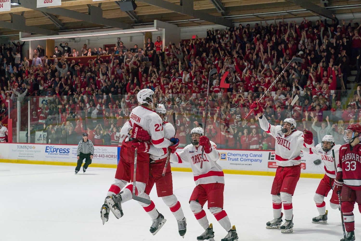 The immediate aftermath of the last-second goal that propelled Cornell over Harvard in the teams' 2017 clash at Lynah Rink in Ithaca, N.Y.