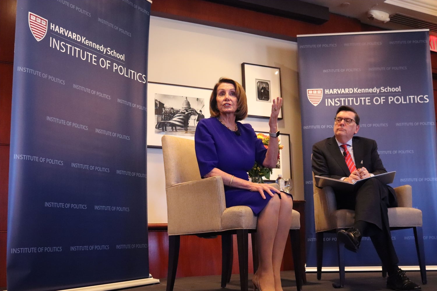 Outgoing Harvard Institute of Politics Director Mark D. Gearan '78 interviews House Speaker Nancy Pelosi in 2018.