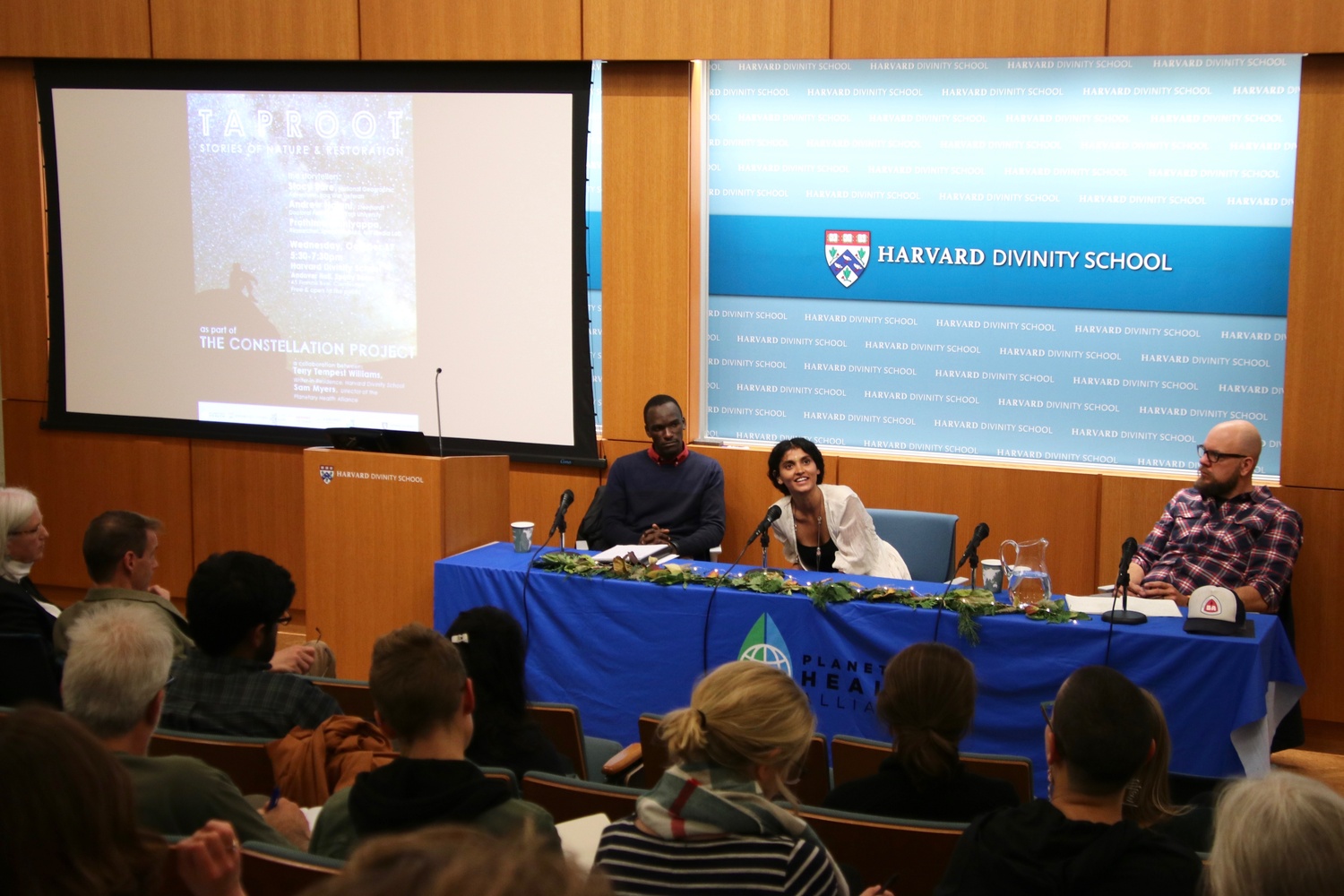 Andrew Nalani, Prathima Muniyappa, and Stacy Bare speak at "Taproot: Stories of Nature & Restoration" on Wednesday evening at Harvard Divinity School.