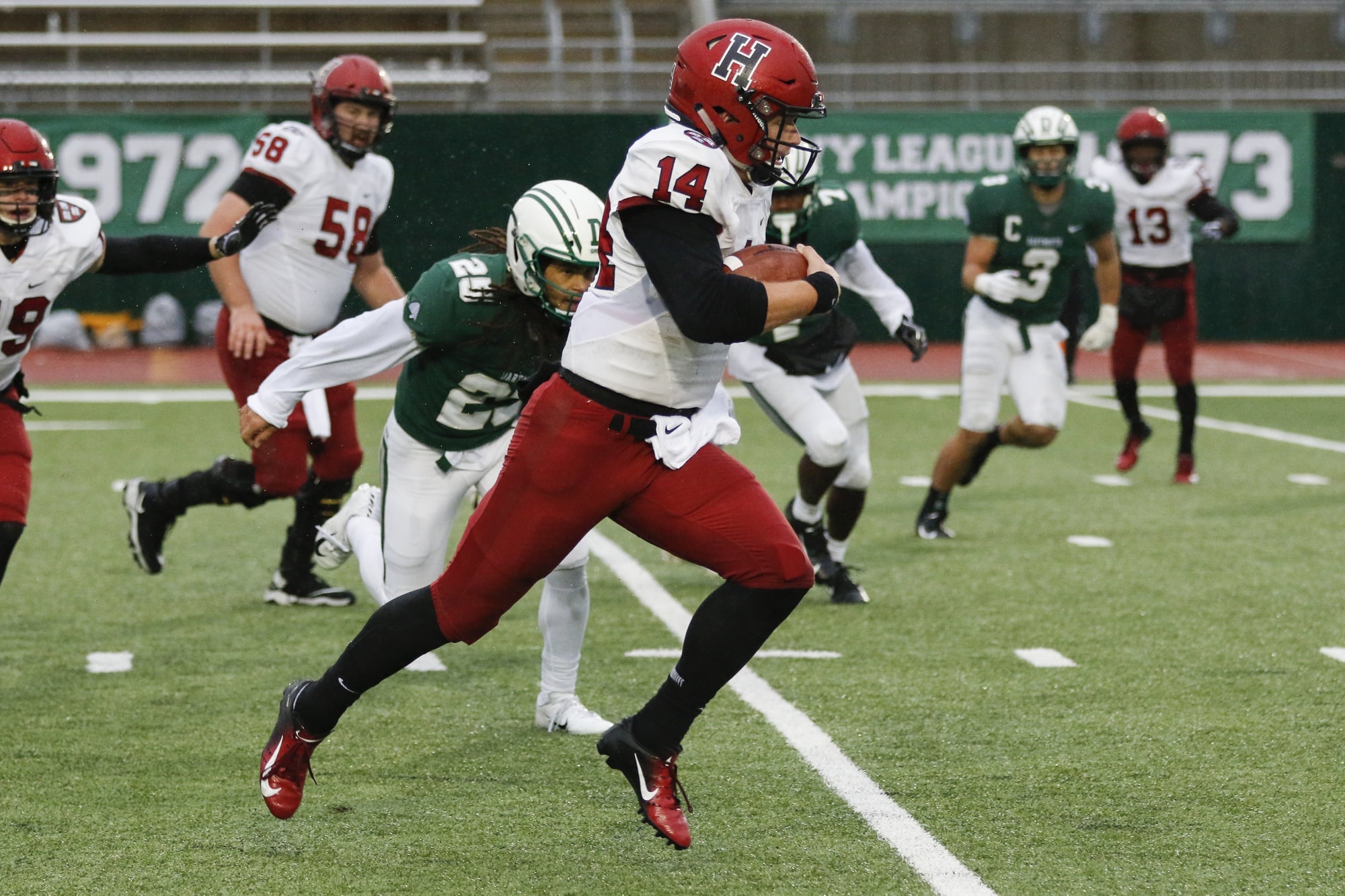 Senior quarterback Tom Stewart escapes for a 22-yard touchdown late in the fourth quarter.