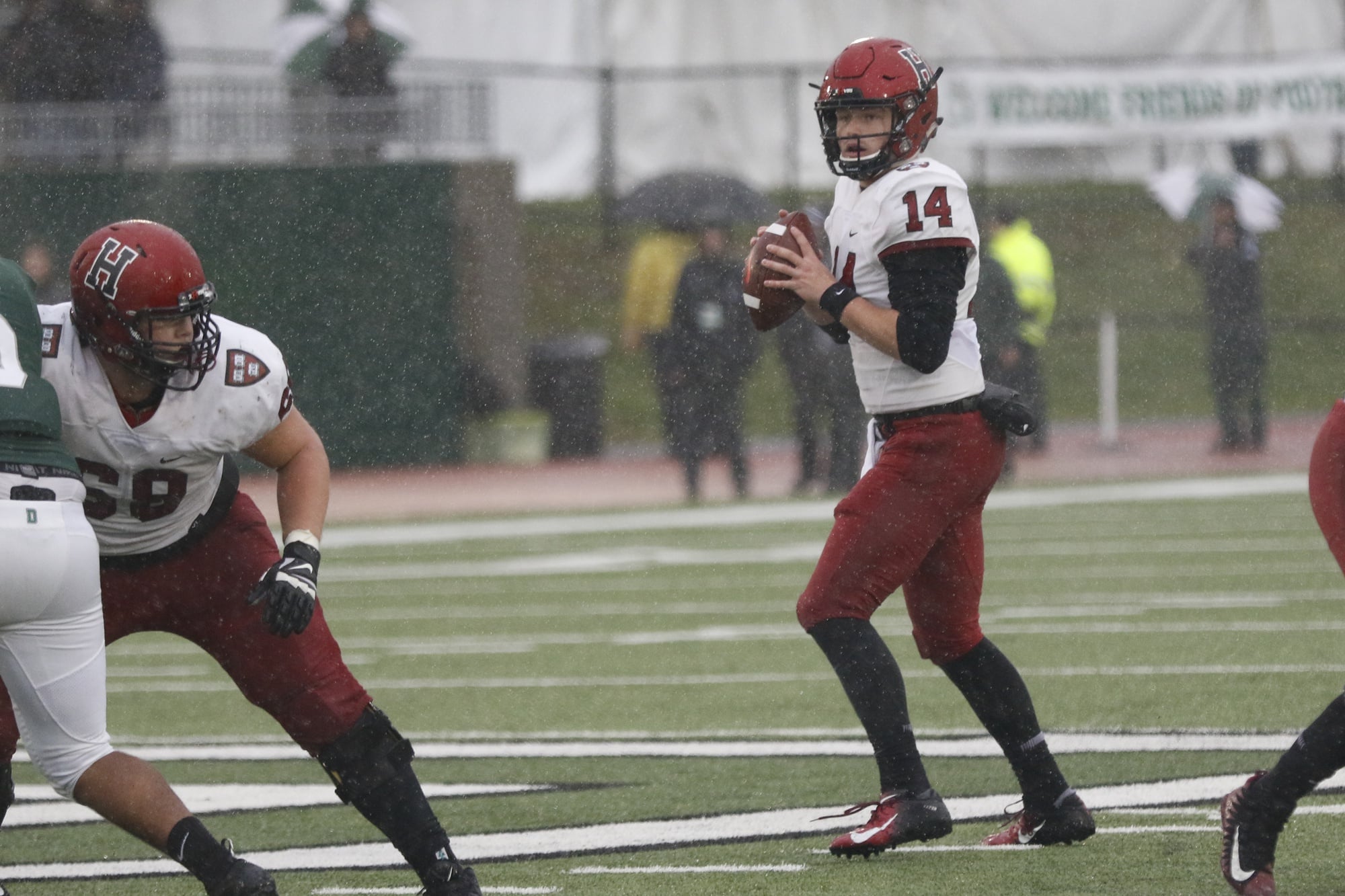 Tom Stewart looks for a target through the downpour last Saturday at Dartmouth.