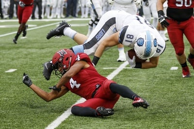 Cover image for Seniors Shine, Wind Swirls, and Football Dismisses Columbia, 52-18