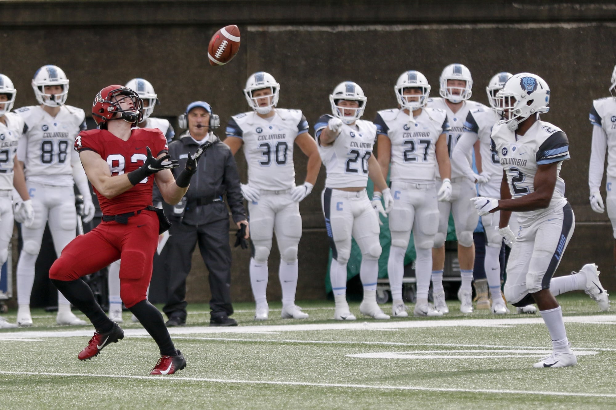 Jack Cook hauls in Harvard's first touchdown of the day. The Crimson went on to score 52 points, its season high.