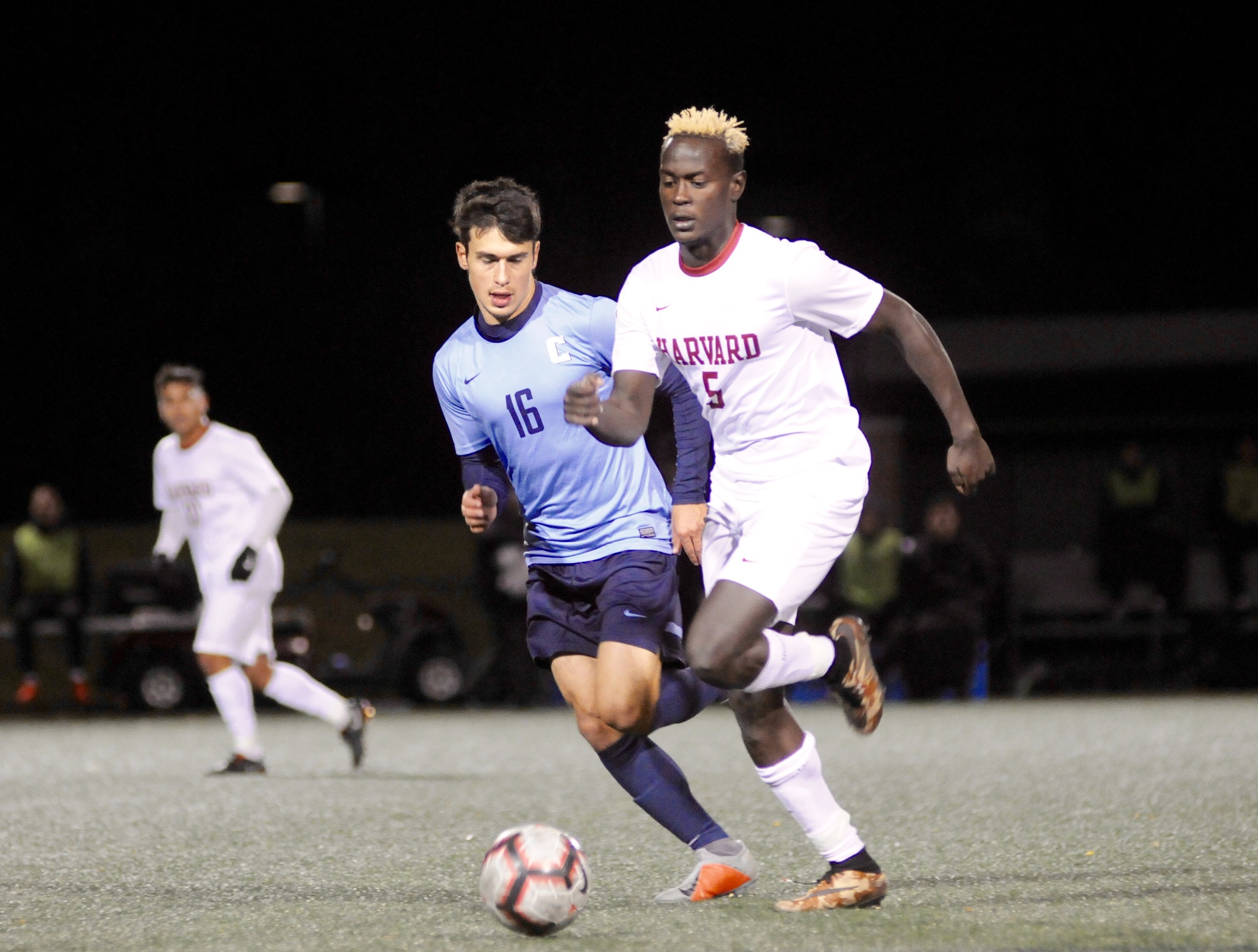 Junior Joel Serugo looks to break away from Columbia's Danny Laranetto.