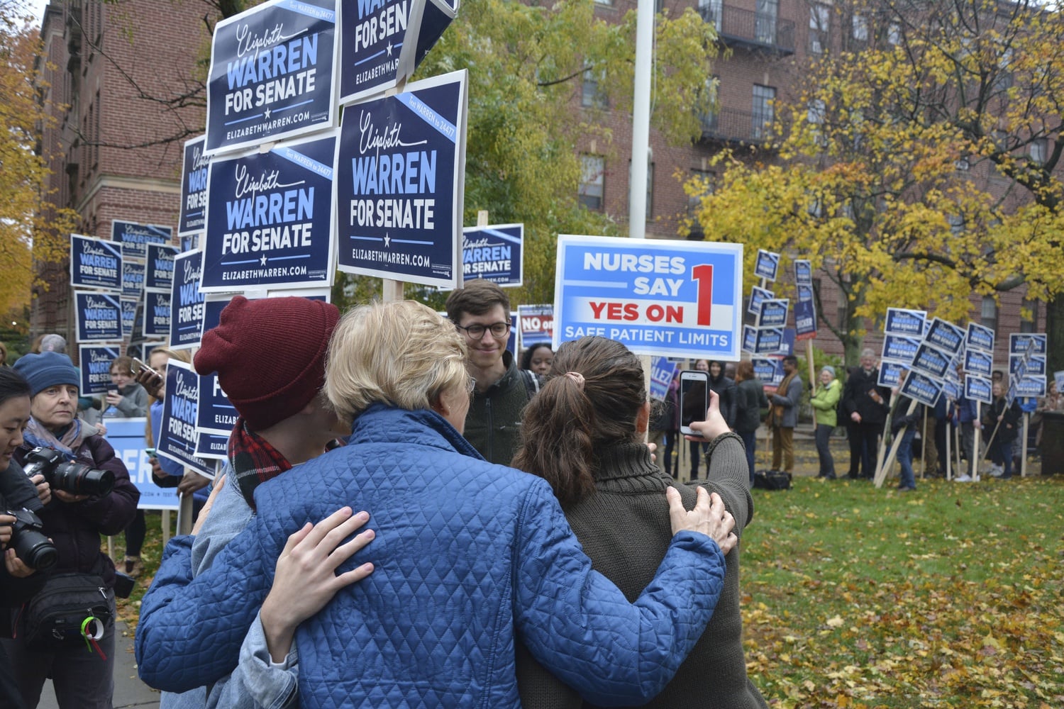 U.S. Senator Elizabeth Warren Poses for a selfie with fans on election day.
