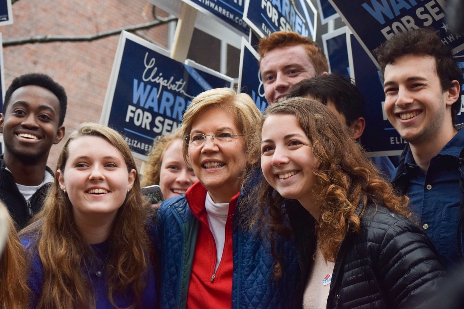 U.S. Senator Elizabeth Warren poses for a photo with members of the Harvard College Democrats in November.