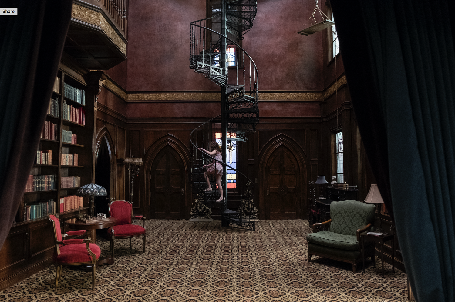A young Shirley Crain (Lulu Wilson) explores the eponymous mansion in “The Haunting of Hill House” on Netflix.