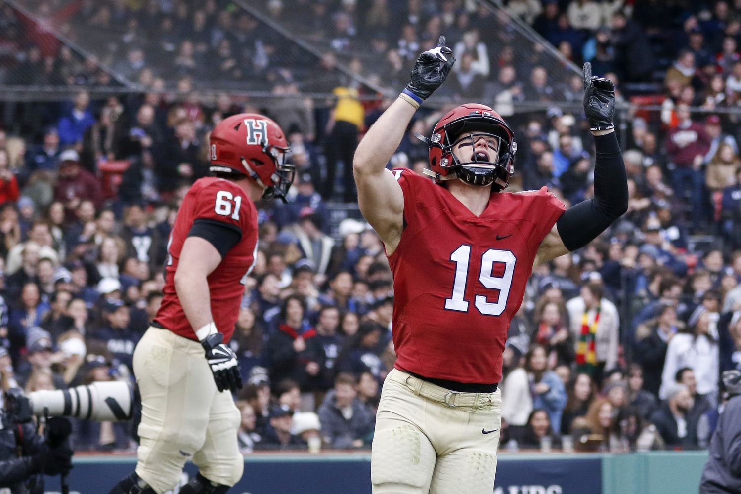 Wide receiver Tyler J. Adams '21 celebrates on the field.