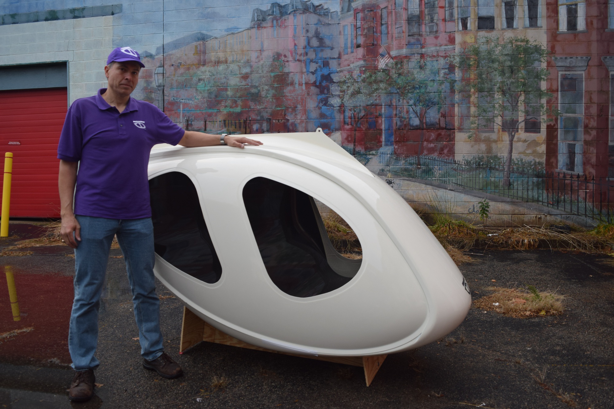 Mike D. Stanley, CEO of Transit X, shows off the pod he hopes will revolutionize public transit.