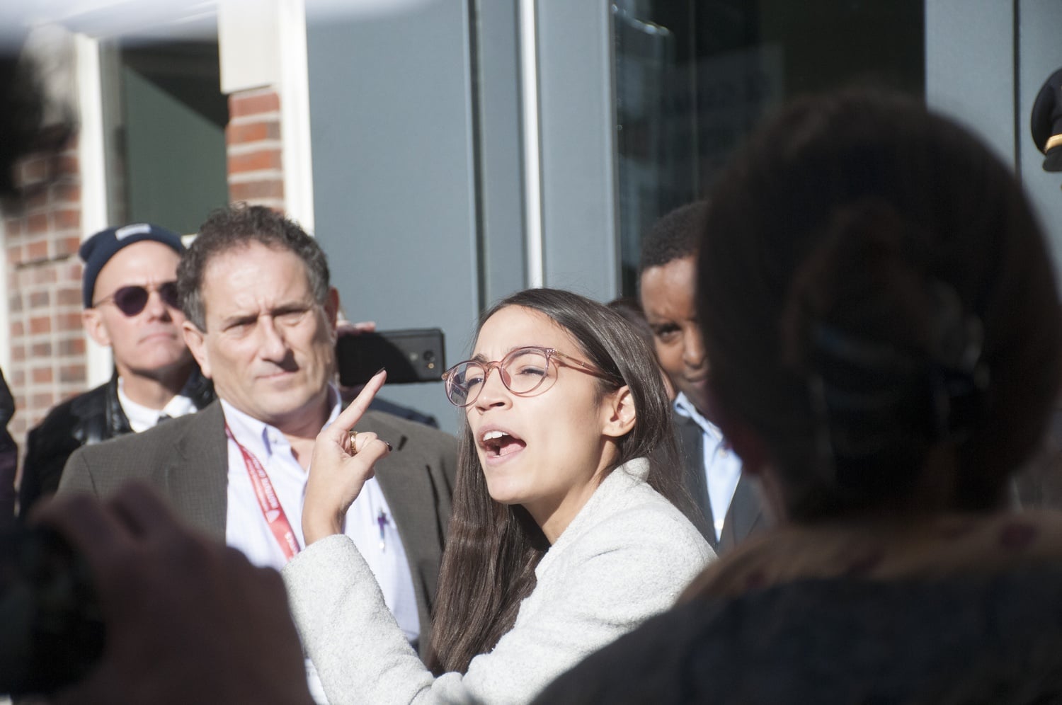 Alexandria Ocasio-Cortez joins a rally to call on the IOP to include environmental justice programming during Harvard's Bipartisan Program for Newly Elected Members of Congress.