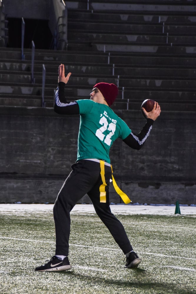 Michael Pankowski ‘22 looks down field as get gets ready to throw the ball.
