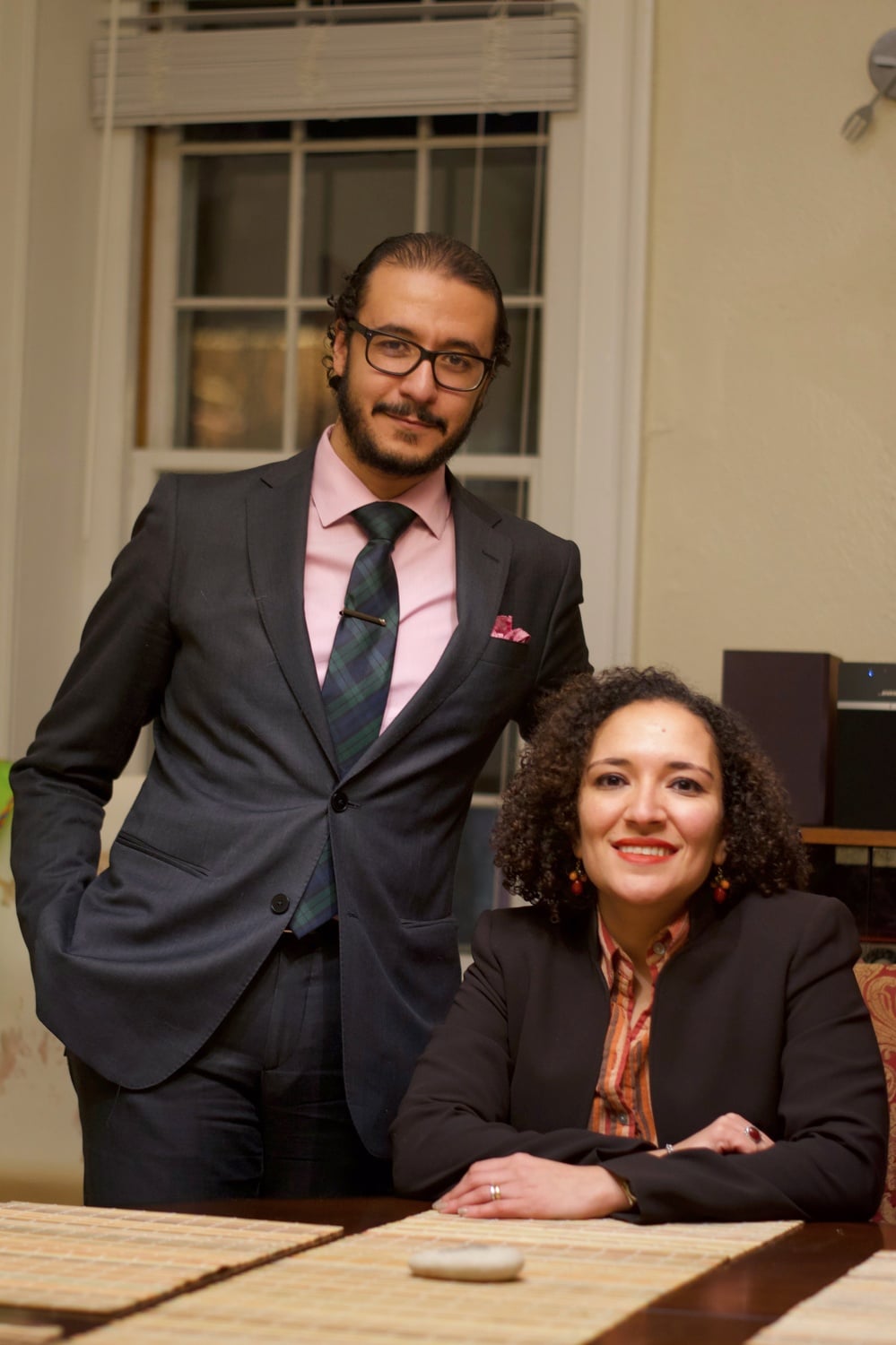 Professor Ahmed Ragab and Professor Soha Bayoumi sit at their dinner table in their Kirkland House home.
