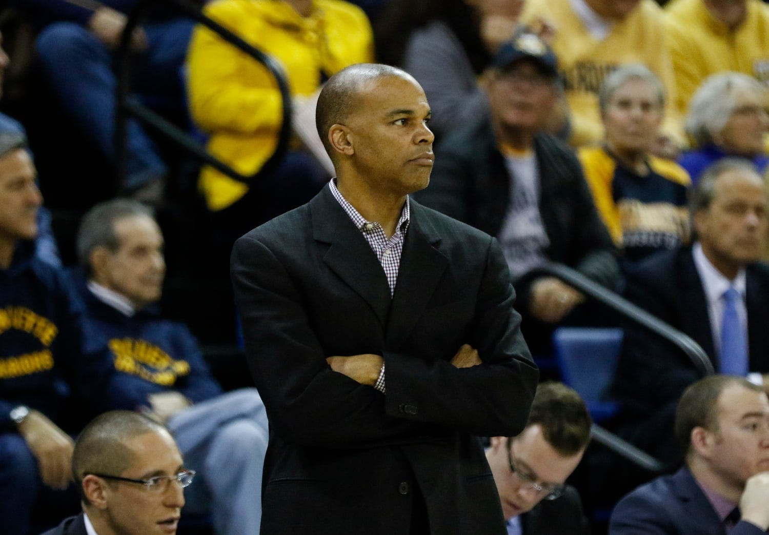Tommy Amaker coaches a game in 2019 at the University of Michigan, where he coached for six years before moving to Harvard.