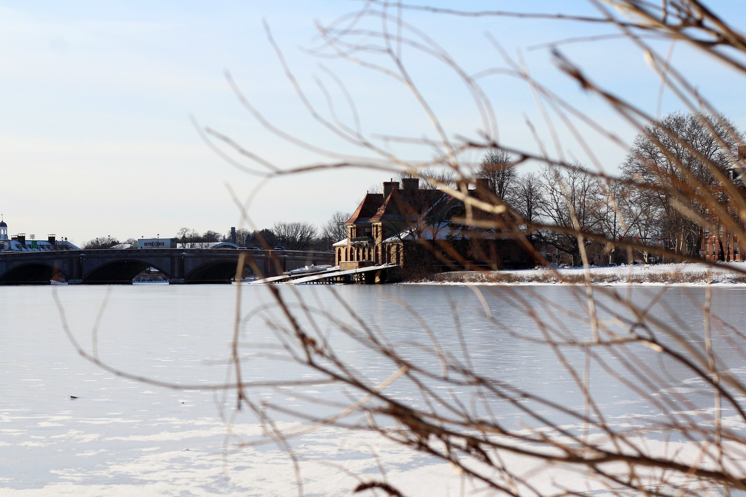 Weld boathouse sits along the frozen Charles River this chilly winter.