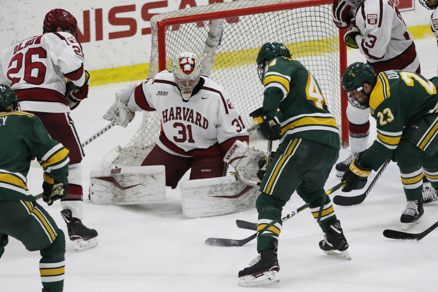 Harvard senior net-minder Michael Lackey left the crease in the game's second period after taking contact on a net-front collision.
