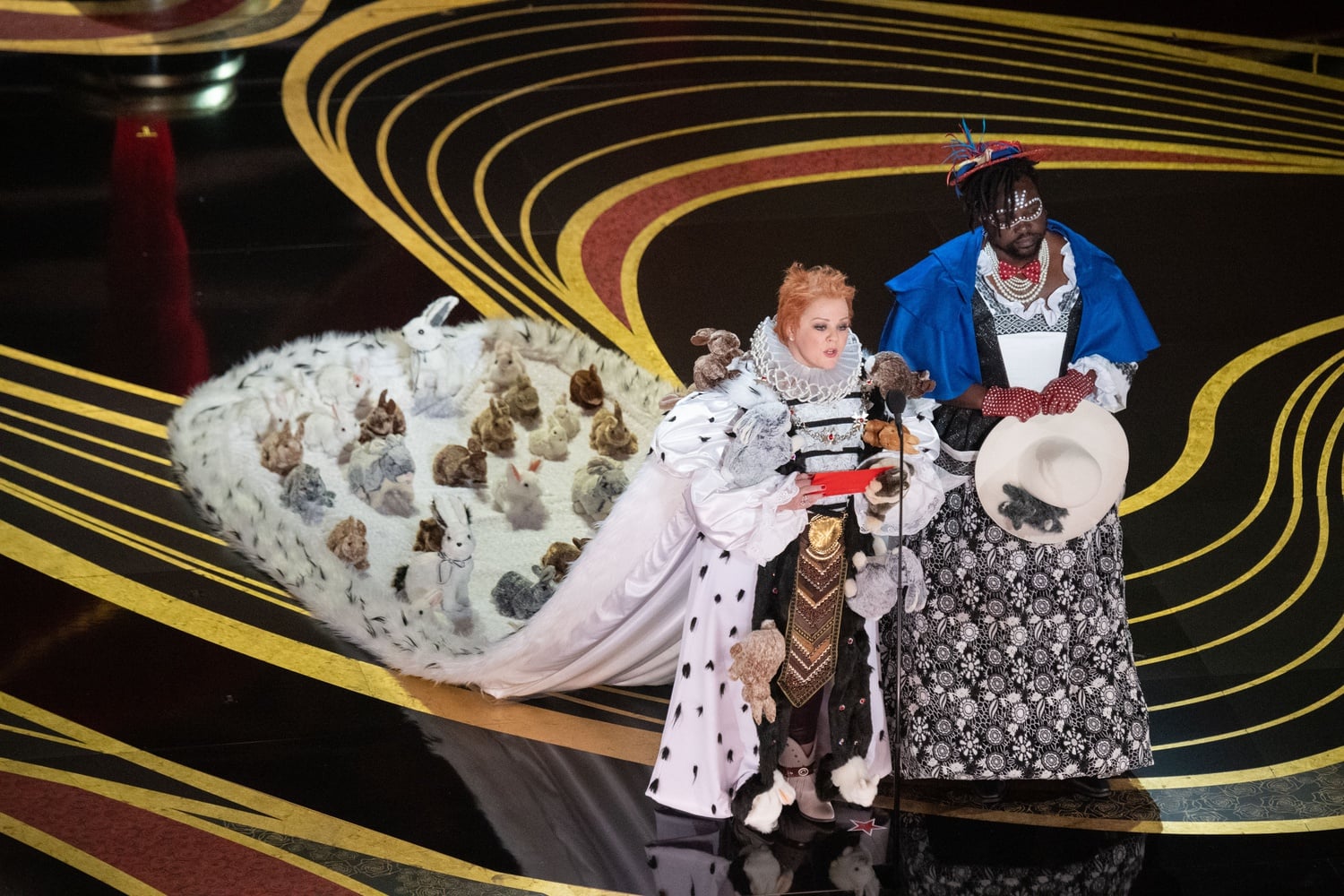 Melissa McCarthy and Brian Tyree Henry present the Oscar® for achievement in costume design on Feb. 24.