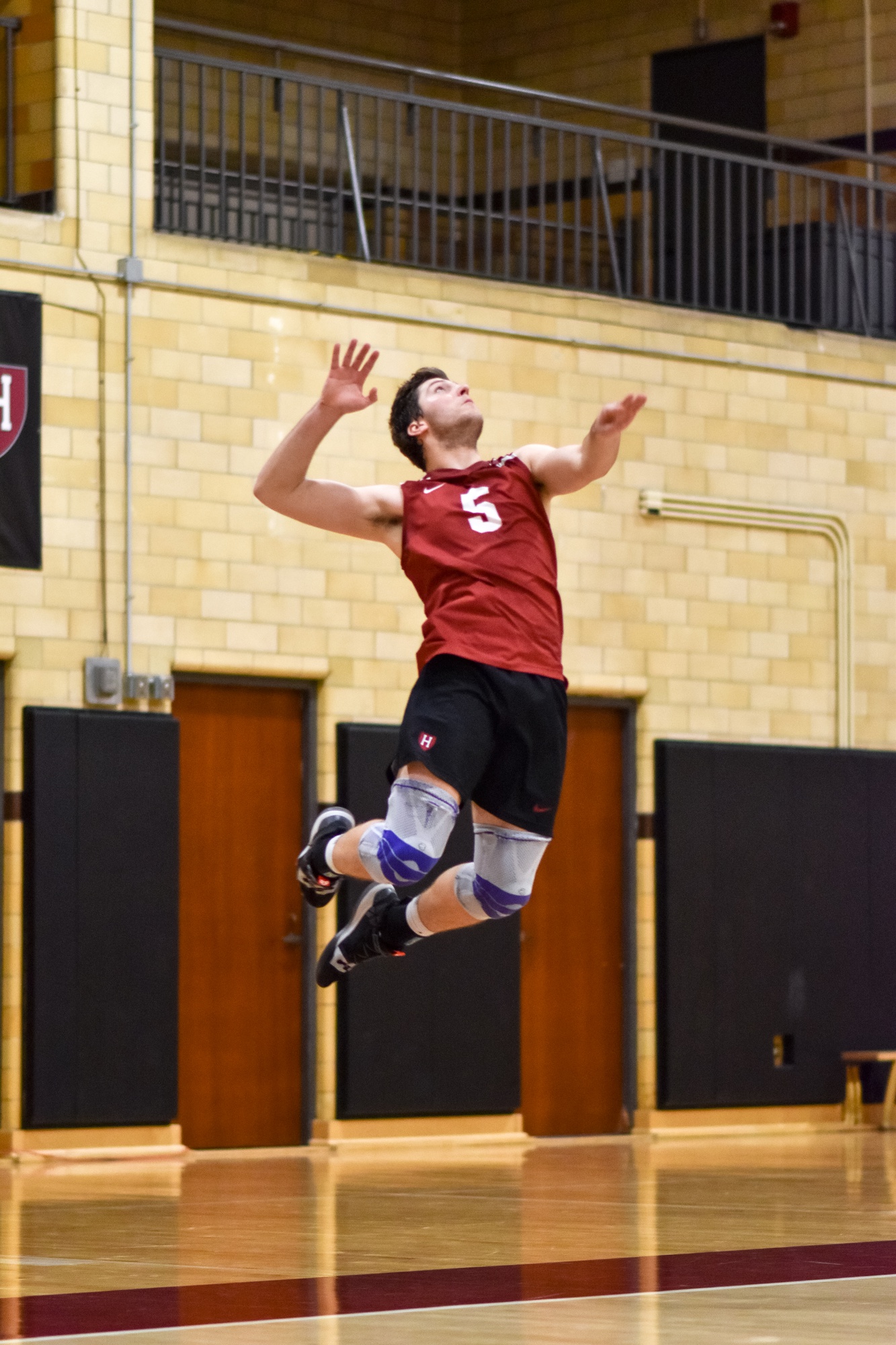 Sophomore Griffin Schmit goes up for the serve in prior action against Purdue Fort Wayne.