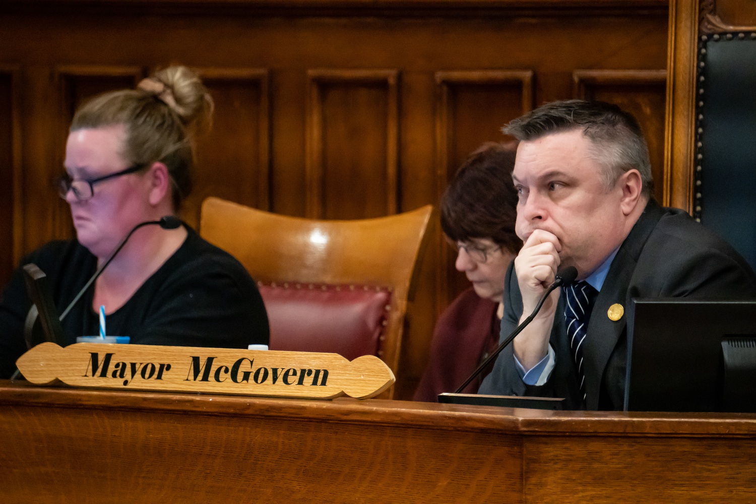 Cambridge Mayor Mark C. McGovern listens to comments from the audience regarding the proposed tree moratorium. The city council voted for the moratorium Monday evening at City Hall in Central Square.