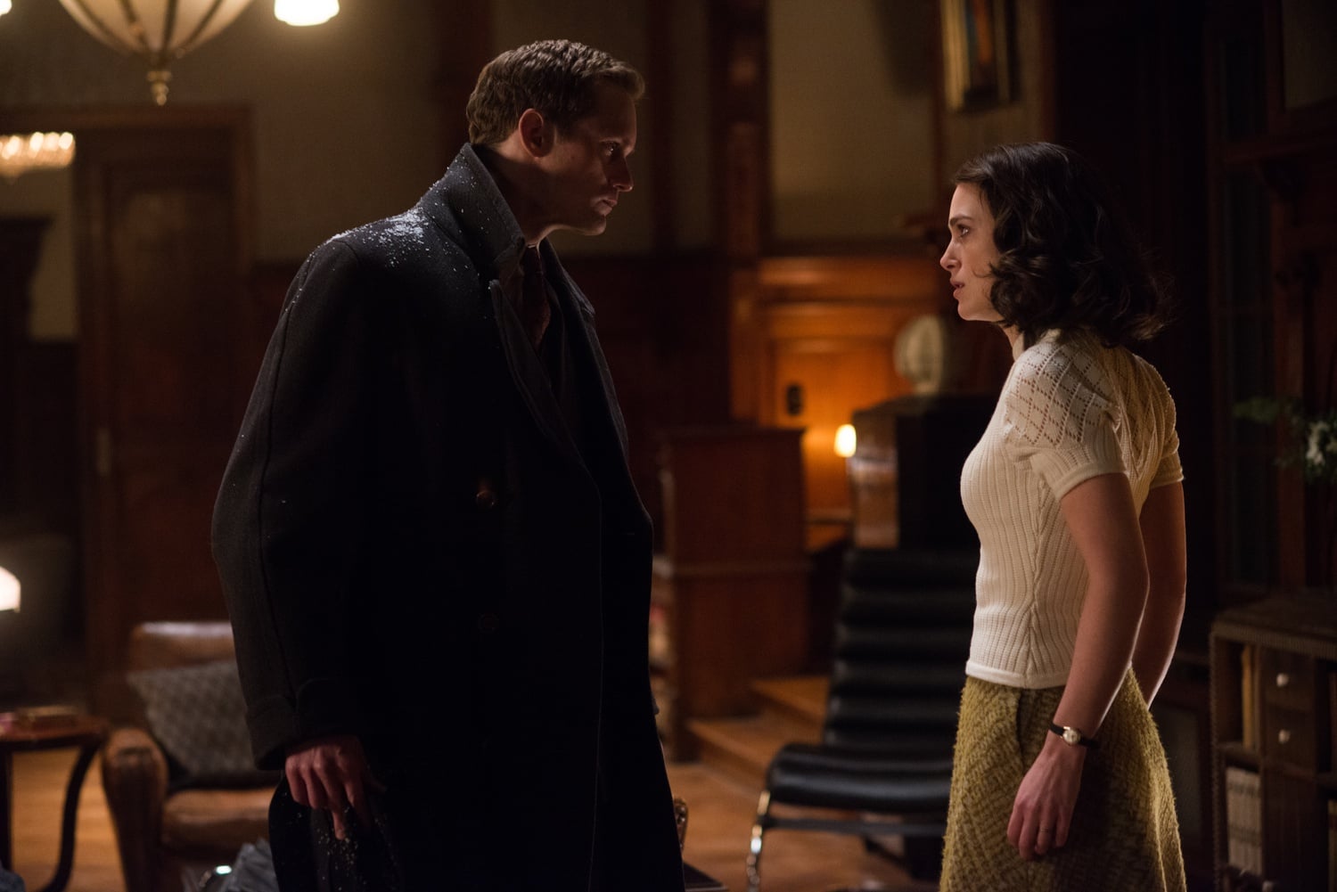 Alexander Skarsgård (left) stars as Stephen and Keira Knightley (right) stars as Rachael in “The Aftermath” (2019), directed by James Kent.
