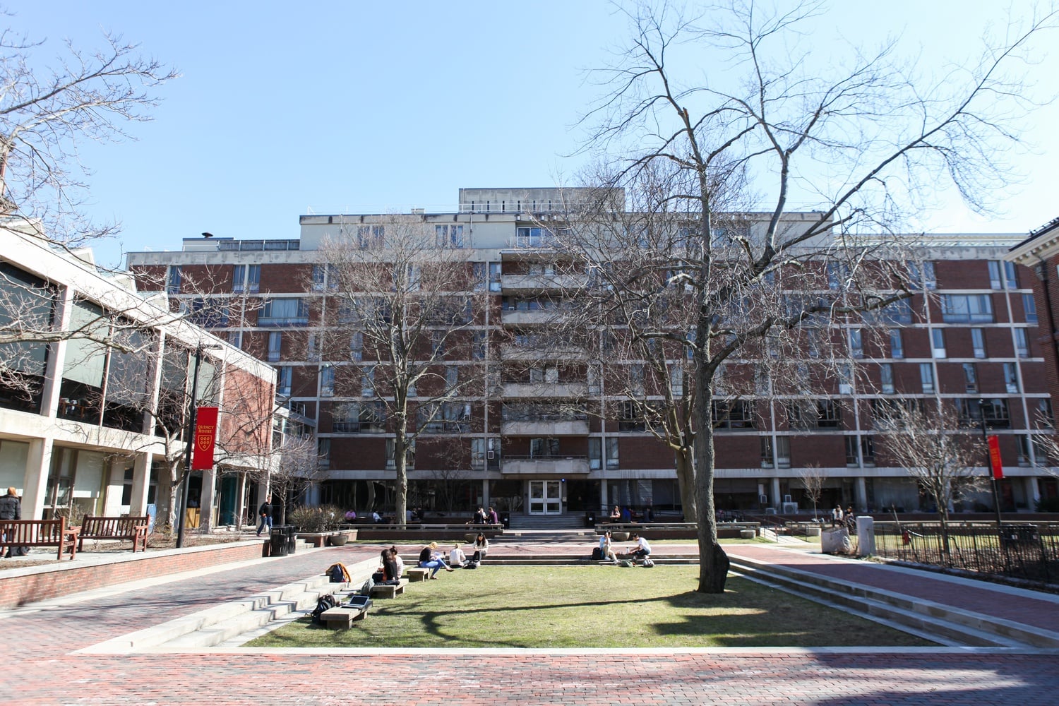 Flyers bearing racial slurs appeared on the door of the Undergraduate Council president's Quincy House dorm Monday morning.