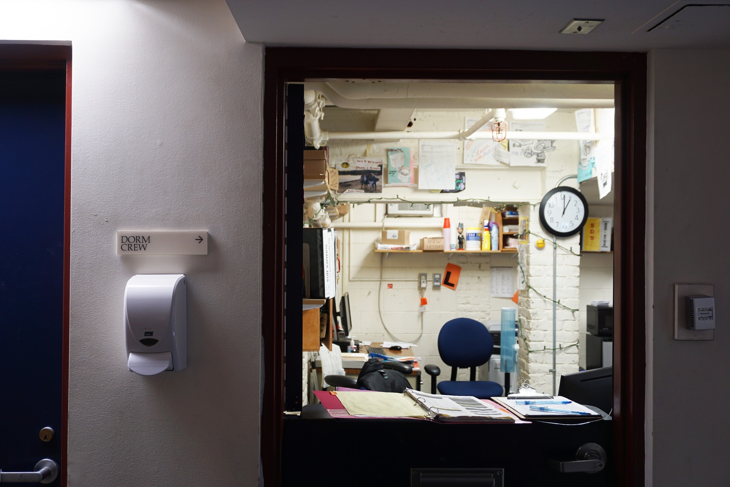 The Dorm Crew office is located in the basement of Weld Hall.