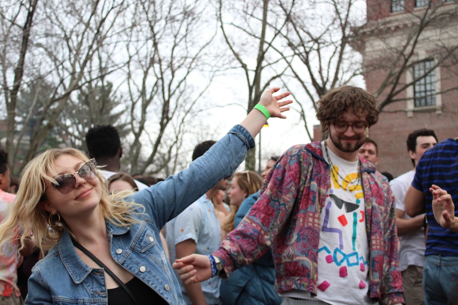 Students dance during the annual Yardfest concert. The College made a series of changes to the event, including moving it from Friday to Sunday afternoon.