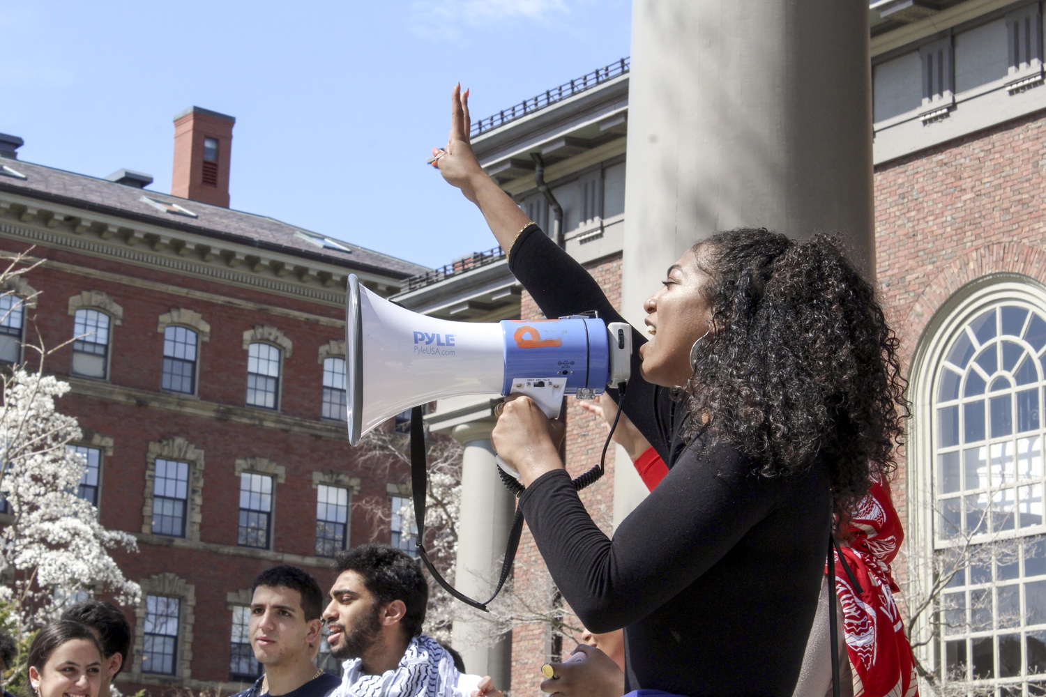 Illham A.T. Ali ‘21 leads the crowd in chants of “respect Sudanese existence or expect Sudanese resistance.”