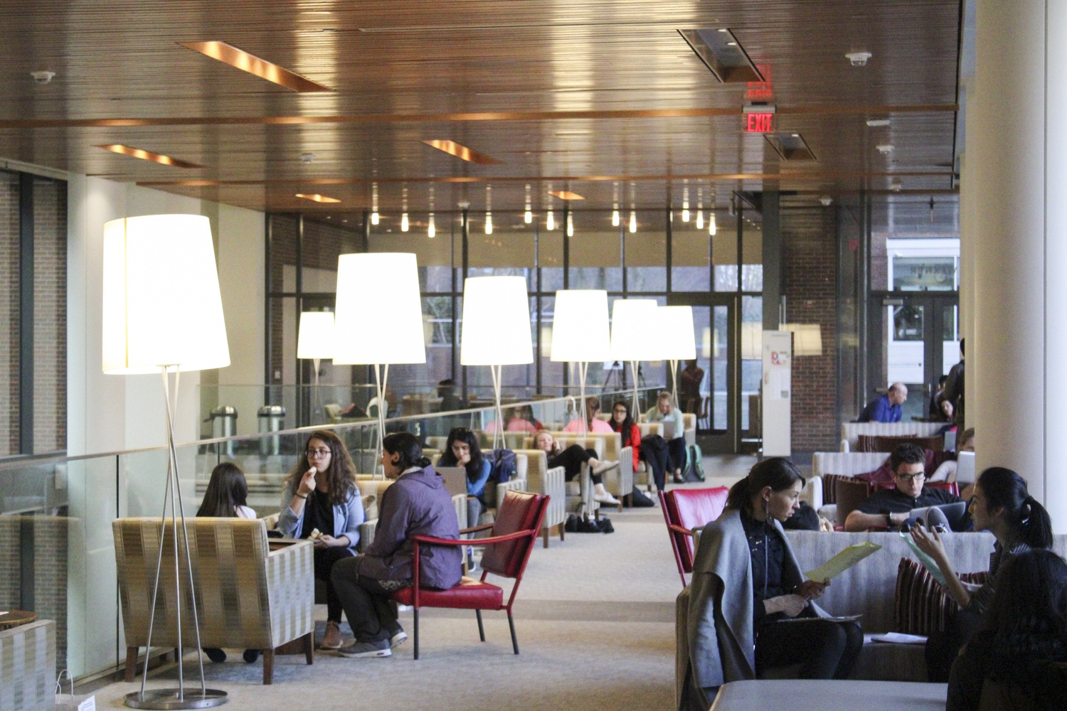 Students work inside the renovated Littauer Building of the Harvard Kennedy School.